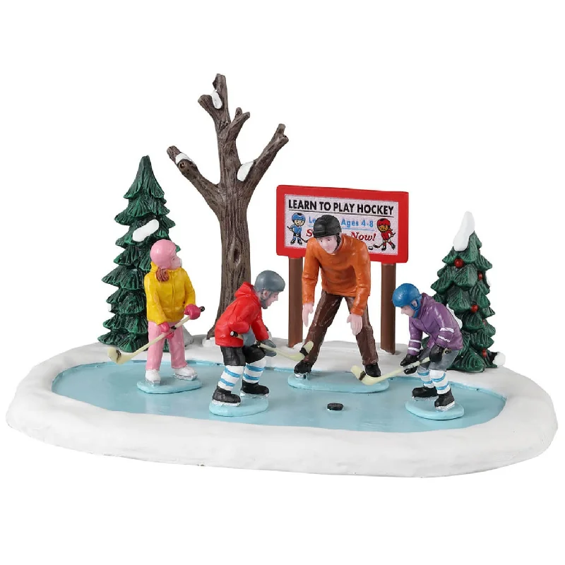 Lemax Vail Village Table Piece: Tiny Tikes Hockey Lessons #33623